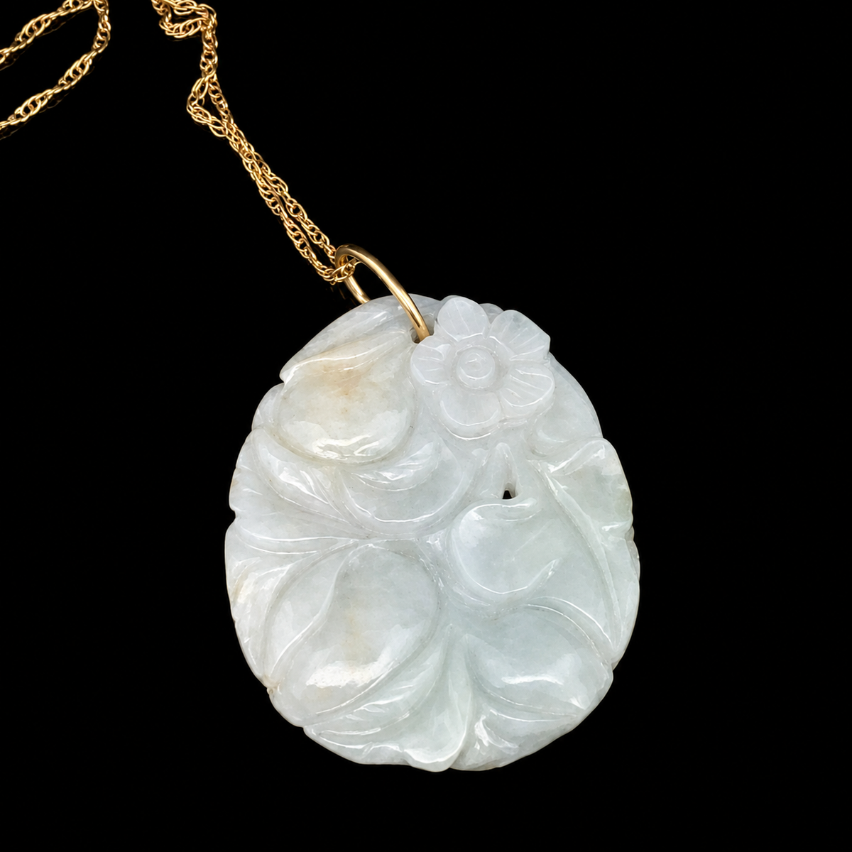 29.88ct, Burmese, Light Green Jadeite, 34.02x26.72x4.24mm, Carved Leaf Set in 18KY Gold Bail with 18" Gold Chain – front view