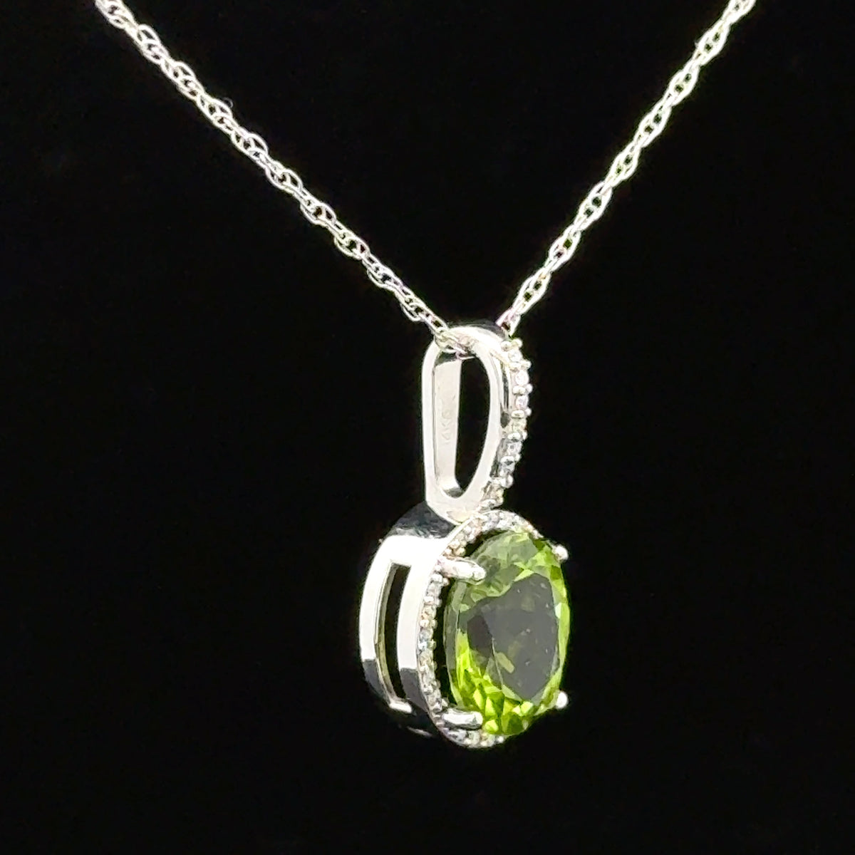 2.91ct, 10x8mm Oval Peridot Pakistan, Set in 14KW Gold with Halo Natural Diamonds 0.07ctw , I1 G-H, with 18" 14KW Gold 1mm Cable Chain Necklace – side view